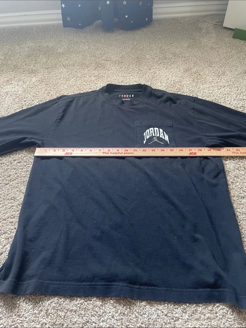 Jordan Long Sleeve Pocket Tee in Black with White Logo